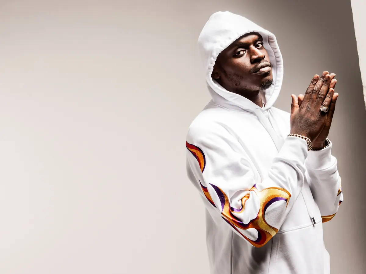Image of Agassi “Sneakbo” Odusina